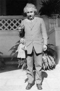 75Albert Einstein holding Einstein puppet1930