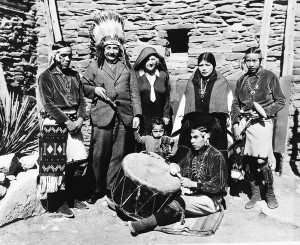 80Albert Einstein poseswearing a headdress with his wifeElsa Einstein and a Hopi tribe in Grand Canyon Ariz1931